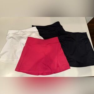 Set of 4 skirts with built in shorts - Pink, Black, White